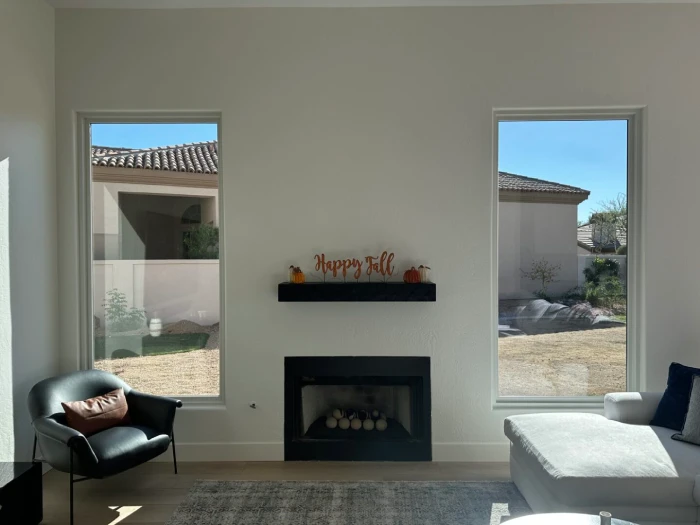 guest house entryway remodel with decorative glass double doors and matching accent windows