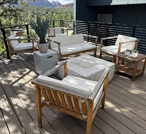 phase4 Remodeled outdoor living space with wood deck, patio seating, and mountain views